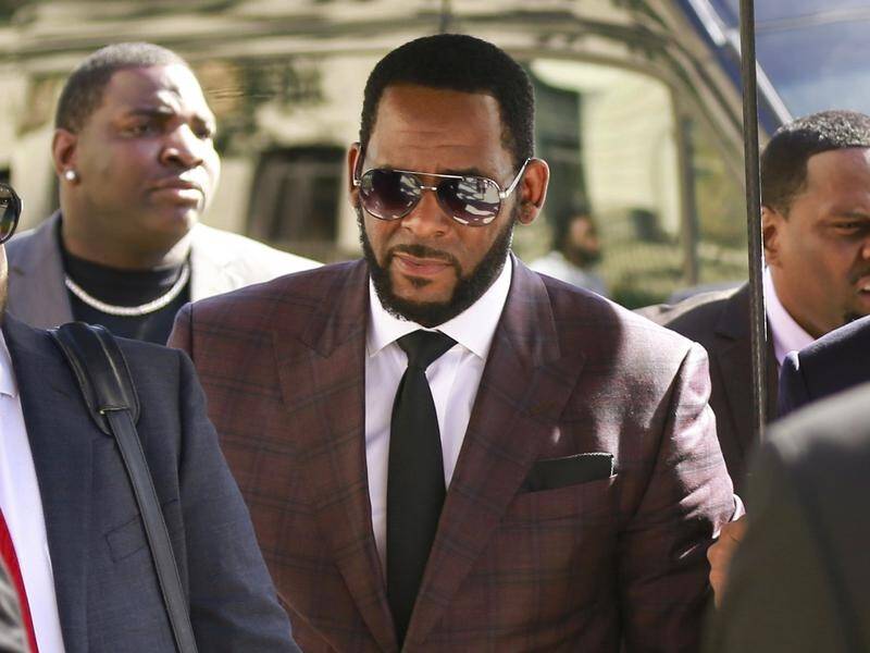 R.Kelly "bought his acquittal" by paying an alleged victim not to take the stand, a lawyer says.