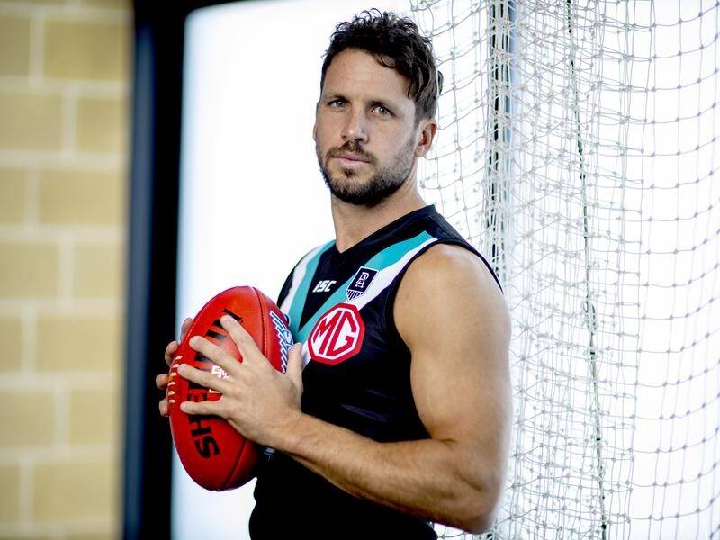 Travis Boak has passed up AFL free agency to remain with Port Adelaide until at least 2022.