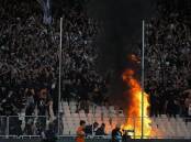 A fire burns seats before the Greek Cup Final in which Panathinaikos defeated PAOK 1-0 in Athens.
