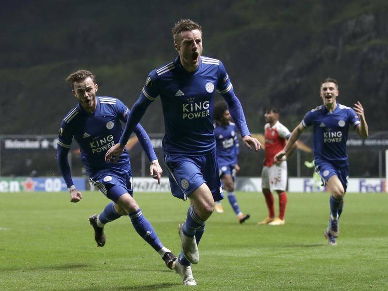 Jamie Vardy scored in time added on to take Leicester City to the next round of the Europa League.