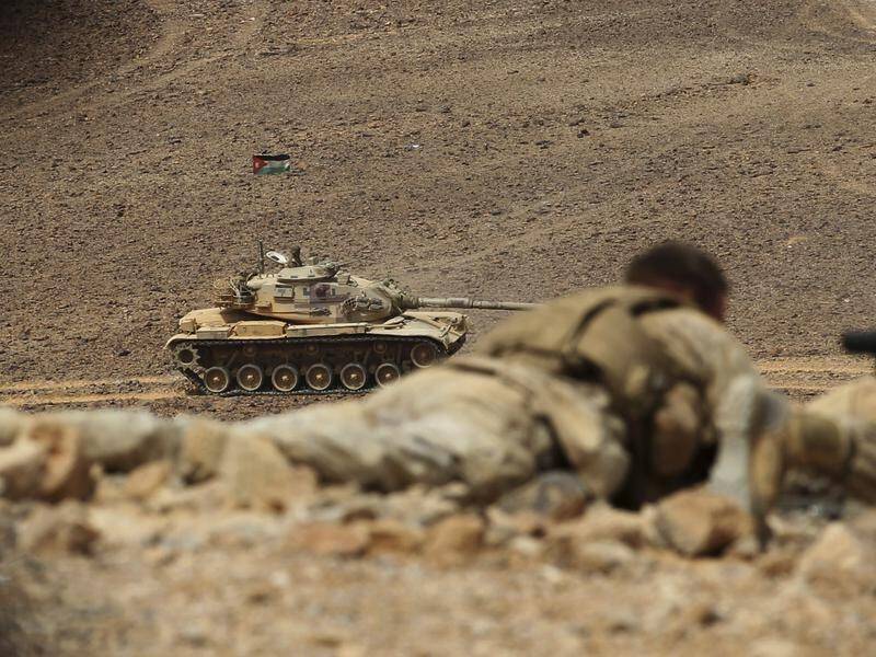 Jordanian troops have killed 27 people suspected of smuggling drugs from Syria, the military says.