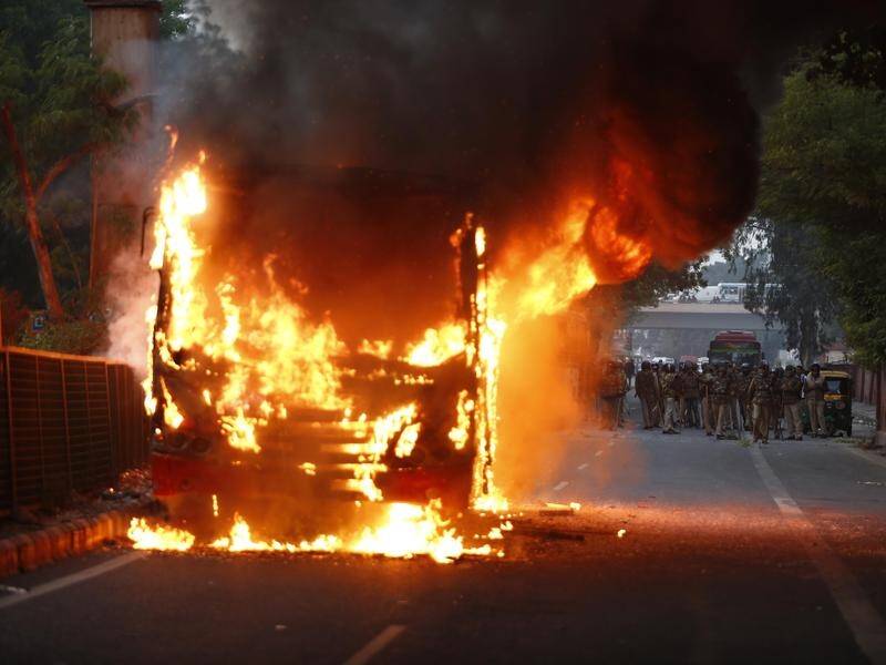 Protesters in New Delhi have torched buses and cars as violent demonstrations continue in India.