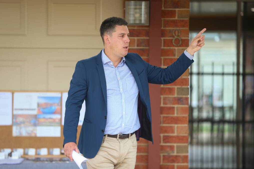 SOLD: PJ Murphy auctioneer Leon Kowski overseeing the sale of 8 Coulston Street, which sold for $645,000 on Saturday. Picture: JAMES WILTSHIRE 