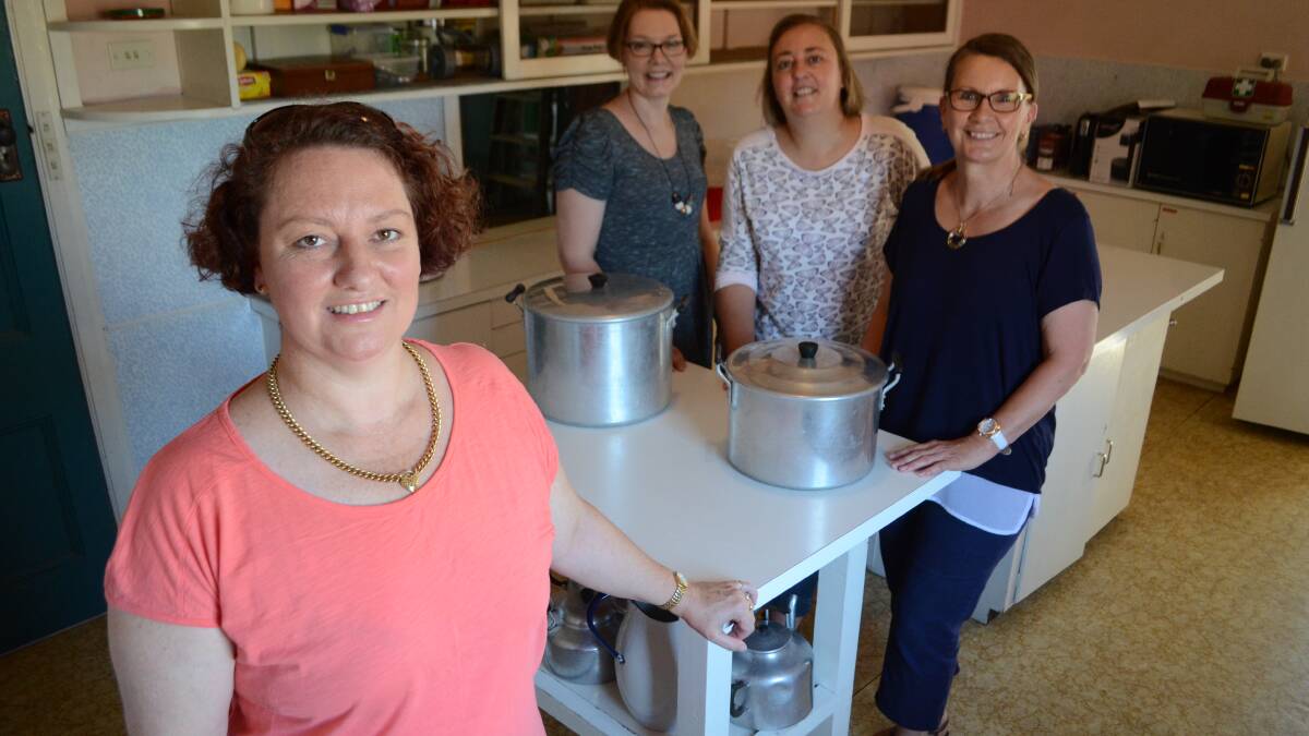 VOLUNTEERS: Committee members Kate Zuzek, Trude Blizzard, Nicole Freeman and Lynne Smith. Absent: April Daniels and Melinda Lattimore in the community kitchen on Lynch Street, Young.         (commkitchen (11))