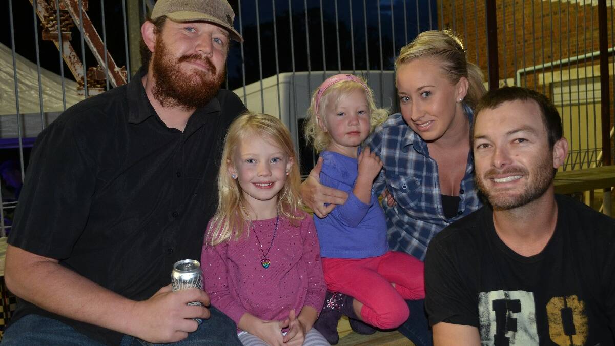 MURRINGO: Murringo residents Adam Harvey, and Sienna (4), Georgia (2), Nichole and Brendan Wheeler all made the trip out to the Young Showground on Saturday night.