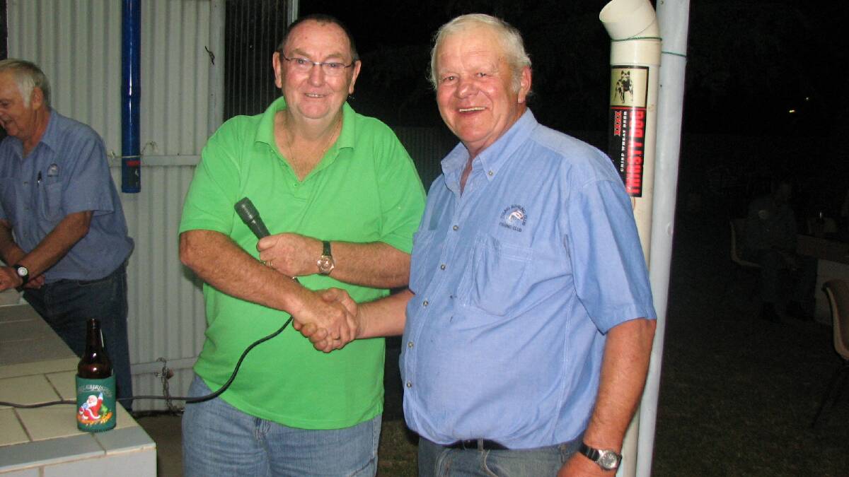 winner: President of Young Bowling Club Fishing Club Joe Chambers congratulated by Snow Woods, President of The Great Eastern Hotel Fishing Club for catch and release of the most Murray cod for 2014. 