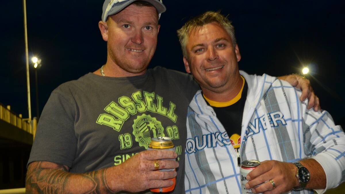 MATES: Having a drink at the Young Carnival of Cups meeting at the Young Showground on Saturday night was Kai Frame and Steve Deveney of Young.