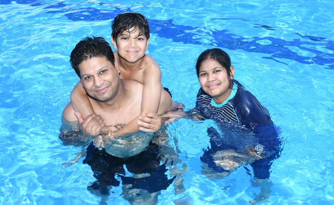 SWIMMING SEASON: Rahul, Ritvik and Ridhi Gupta at Dubbo Aquatic Leisure Centre earlier this year.