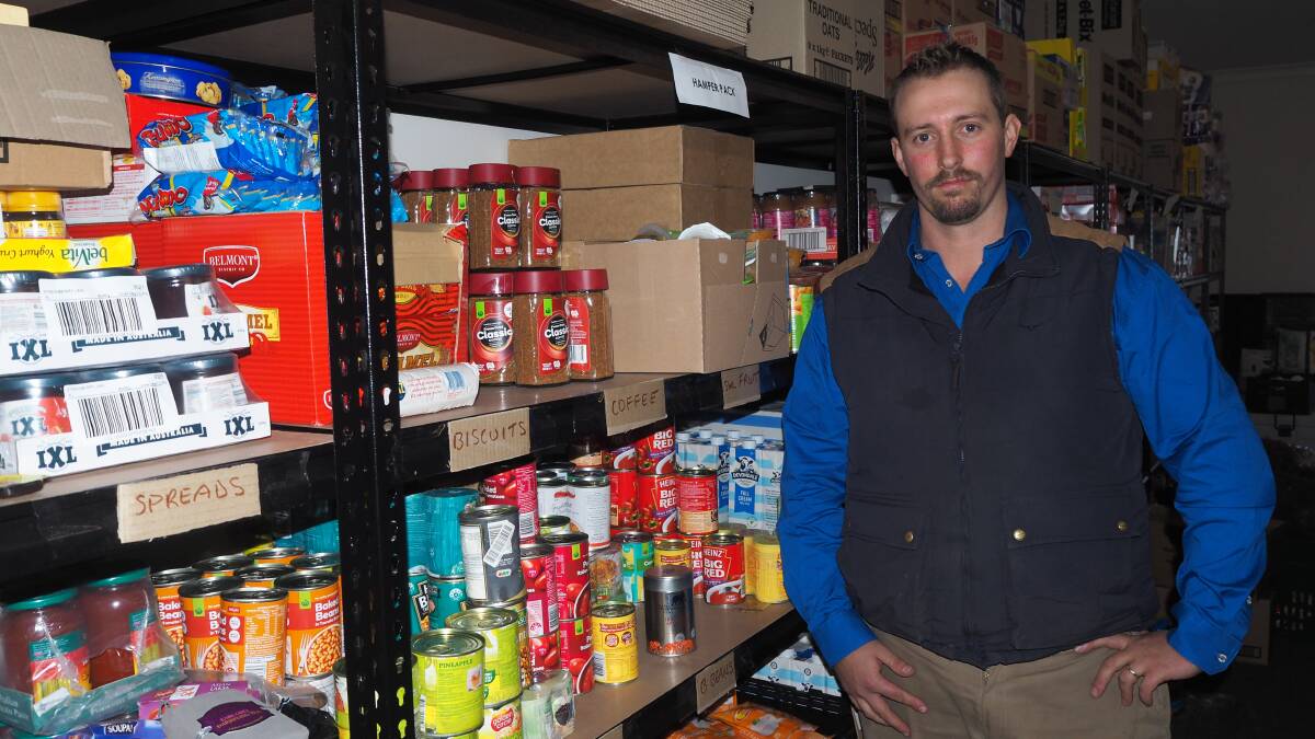 HELP ON HAND: Hope Care Bathurst operations and welfare services manager Elliot Redwin has helped deliver 150 tonnes of food through Food Rescue Central West to charities in the region since March. Photo: SAM BOLT