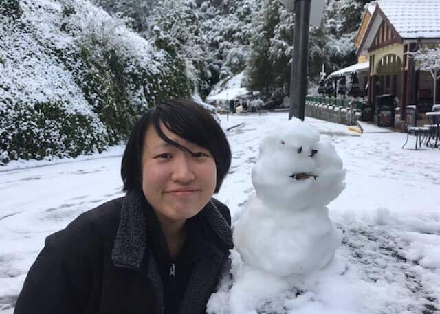 SNOWED IN: Housekeeper Kana was among 22 staff at Caves House who have been snowed in along with 90 guests since Saturday morning. Photo: JENOLAN CAVES