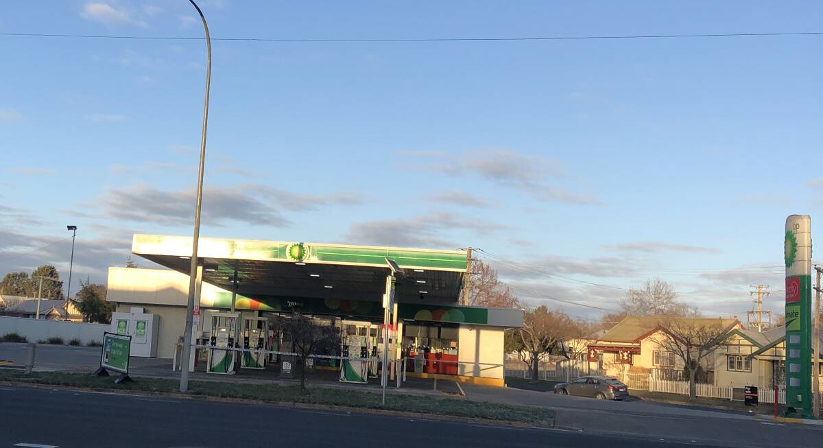 CLOSED OFF: Police tape was still up around the BP service station on the Mitchell Highway many hours after an overnight robbery. Photo: SUPPLIED