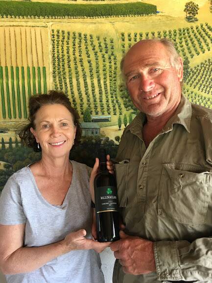 TOP DROP: Ballinaclash Wines owners Peter and Cath Mullany with their medal winning Thomas 2017 Cabernet Sauvignon. Photo: SUPPLIED 102318wine2