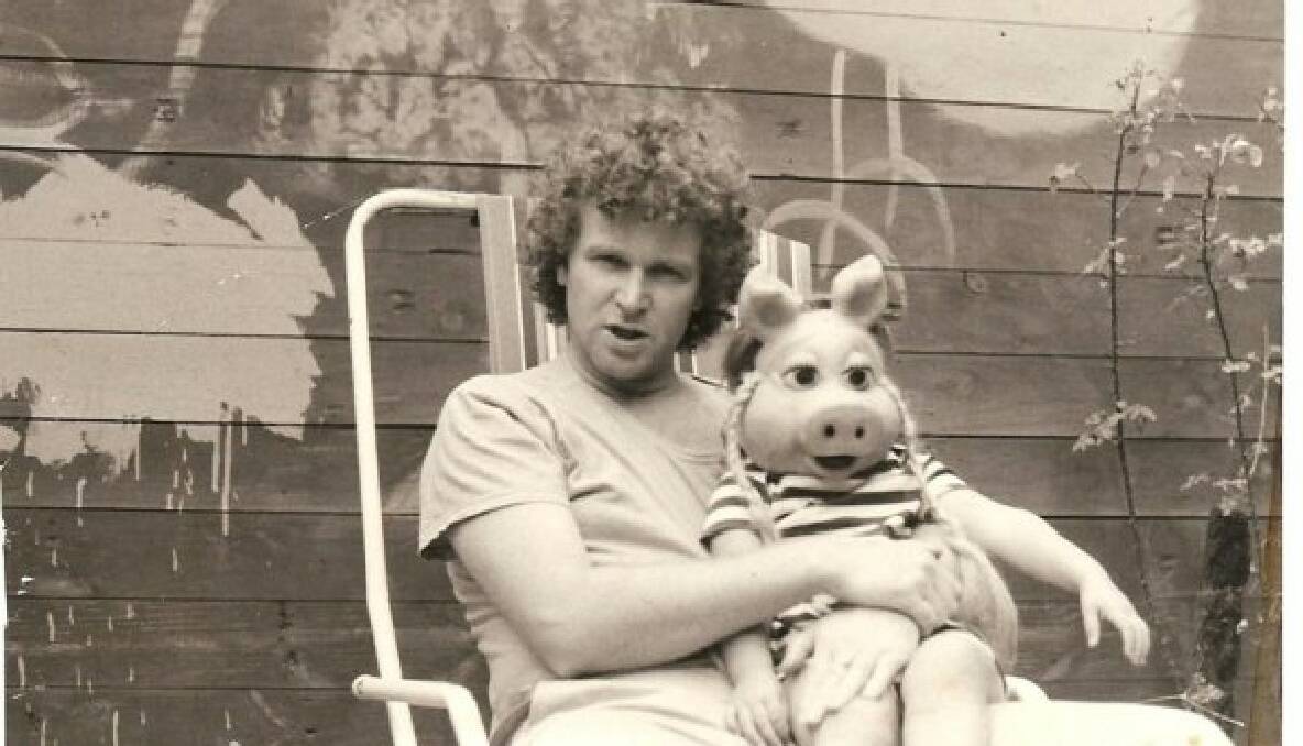 BOOKER: Witness journalist Chloe Booker, around age three or four, looking a little disorientated in a Miss Piggy mask with her father Grant in her backyard in Melbourne in the 1980s. "My crazy dad is like no other - I wouldn't swap him for the world."