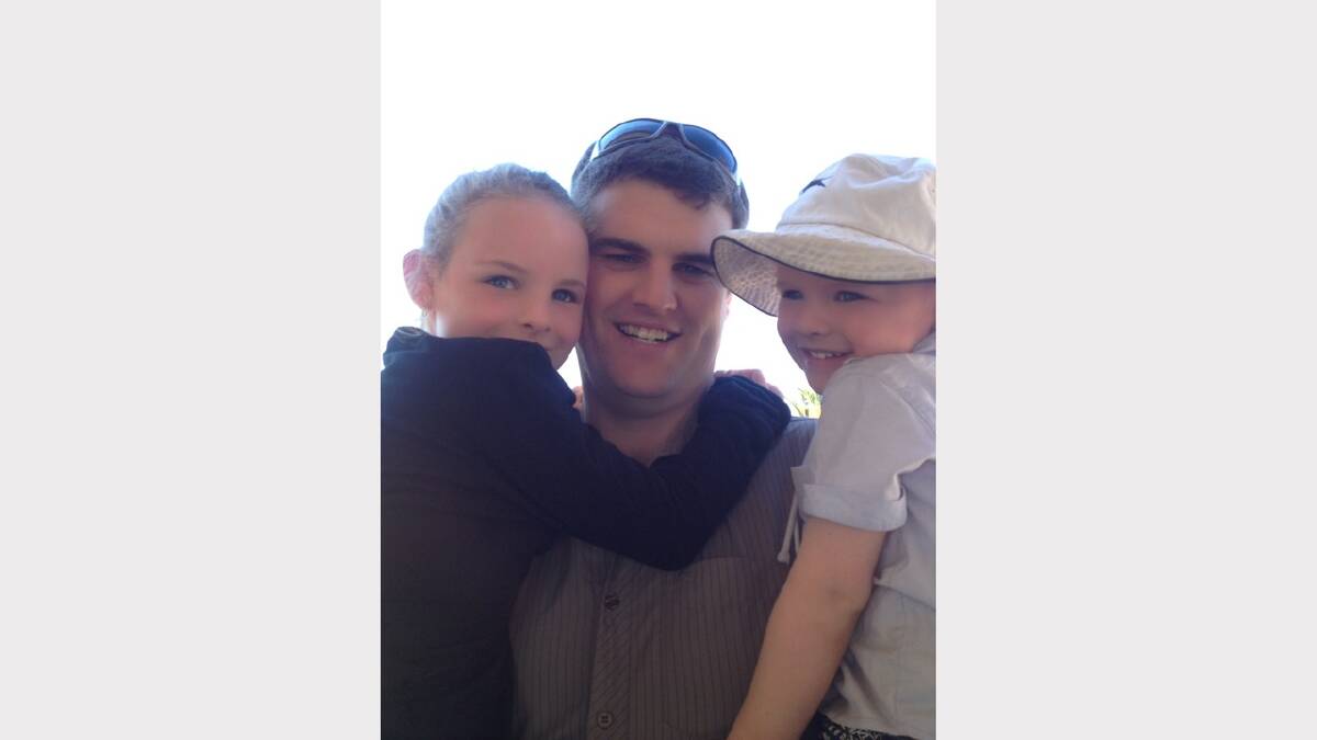 A DADDY’S LOVE: Chris New with his daughter Seanna and son Reiken.